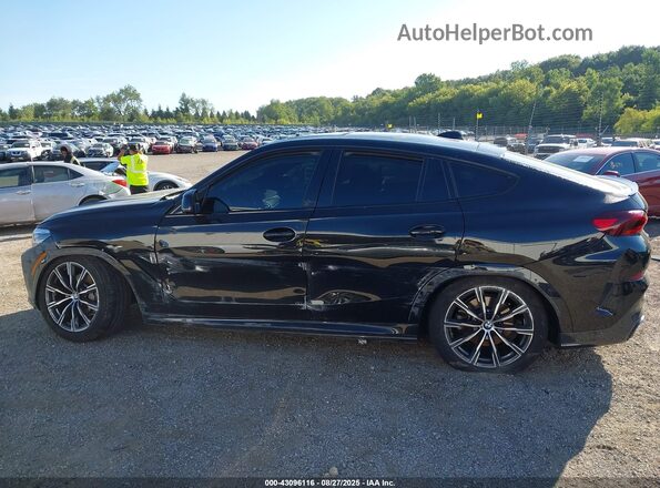 5UXCY6C09P9P42776 2023 BMW X6 Black Vista interior de 360 grados