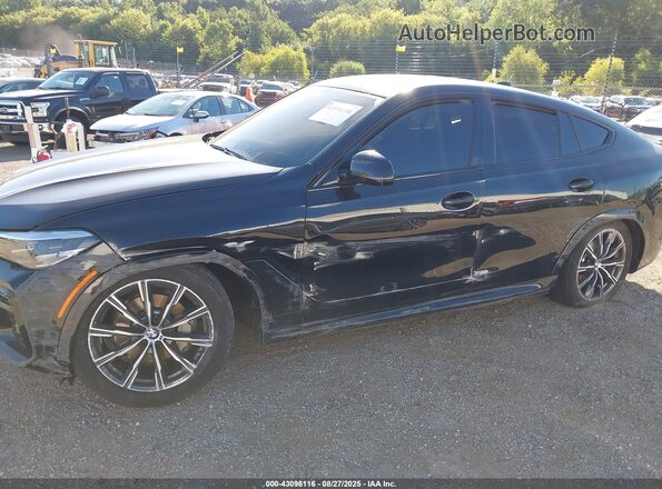 5UXCY6C09P9P42776 2023 BMW X6 Black Vista frontal