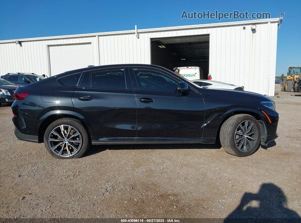 5UXCY6C09P9P42776 2023 BMW X6 Black Vista interior trasera