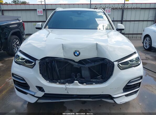 5UXTA6C06M9E96787 2021 BMW X5 White Vista interior trasera