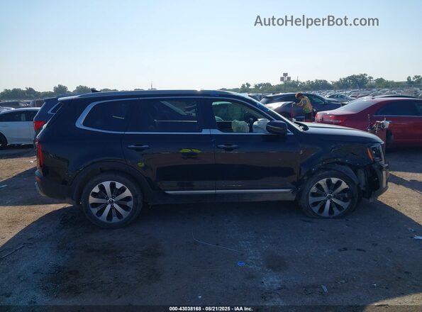 5XYP64HC2MG111975 2021 KIA TELLURIDE Black Widok wnętrza z tyłu