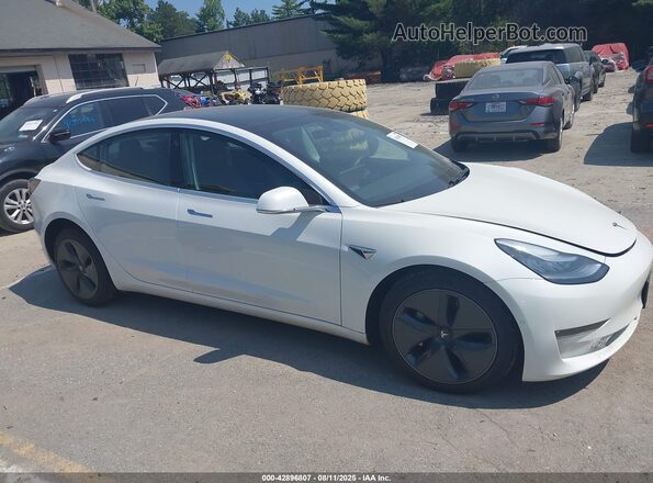 5YJ3E1EB5LF795129 2020 TESLA MODEL 3 White Rear interior view