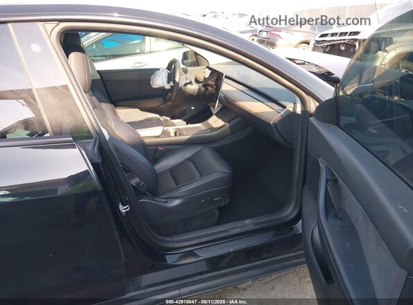 5YJYGDED7MF122895 2021 TESLA MODEL Y Black Front interior view
