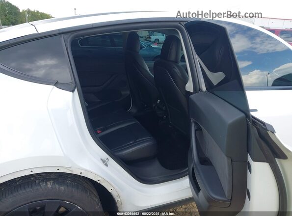 5YJYGDEE9MF080447 2021 TESLA MODEL Y White VIN კოდის სტიკერის ხედი