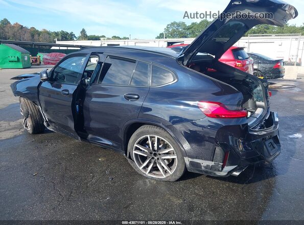 5YM23EC00N9J37507 2022 BMW X4 Dark Blue Rear left