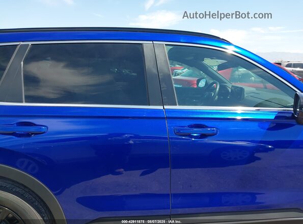 7FARS6H57PE028561 2023 HONDA CR-V HYBRID Blue Widok wnętrza z tyłu
