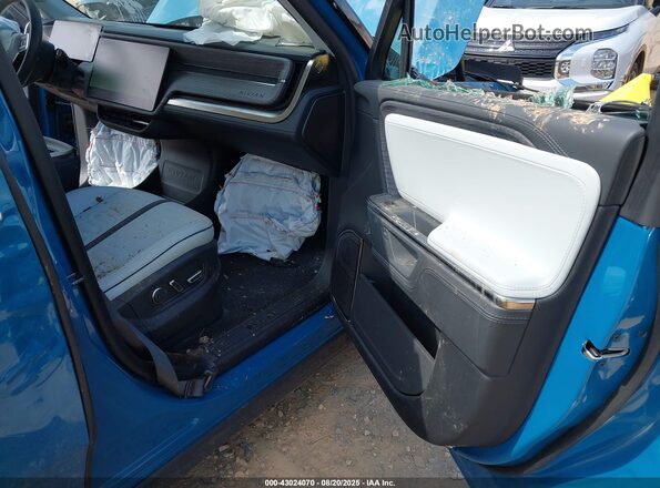 7PDSGBBA3SN072766 2025 RIVIAN R1S Blue Widok wnętrza z przodu