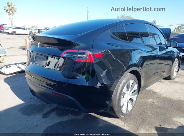 7SAYGDED0RF014743 2024 TESLA MODEL Y Black Trasero derecho