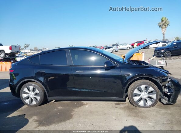 7SAYGDED0RF014743 2024 TESLA MODEL Y Black Vista interior trasera