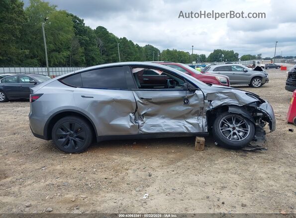 7SAYGDED0SA345552 2025 TESLA MODEL Y Gray Սալոնի հետևի տեսք
