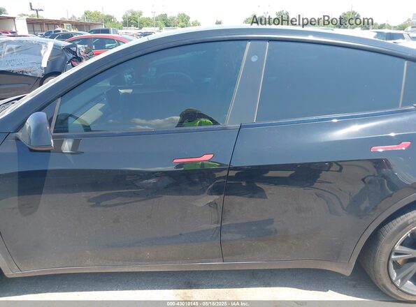 7SAYGDEEXPA087718 2023 TESLA MODEL Y Black უკანა სალონის ხედი