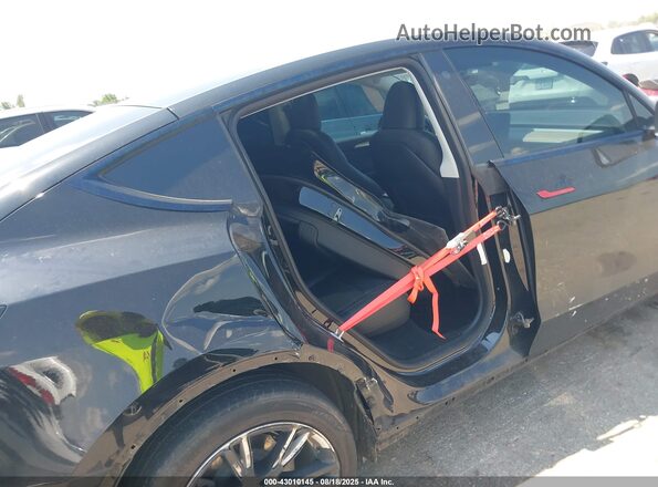 7SAYGDEEXPA087718 2023 TESLA MODEL Y Black წინა ხედი