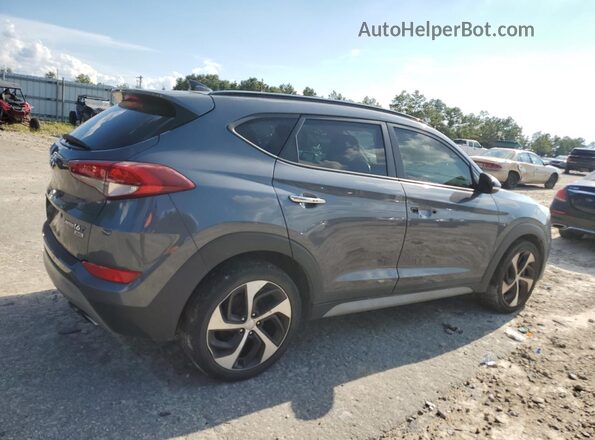 KM8J3CA25JU611614 2018 HYUNDAI TUCSON Серый 