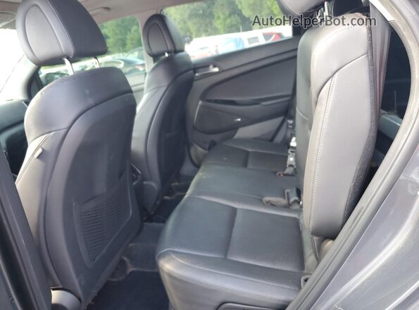 KM8J3CA25JU611614 2018 HYUNDAI TUCSON Серый 