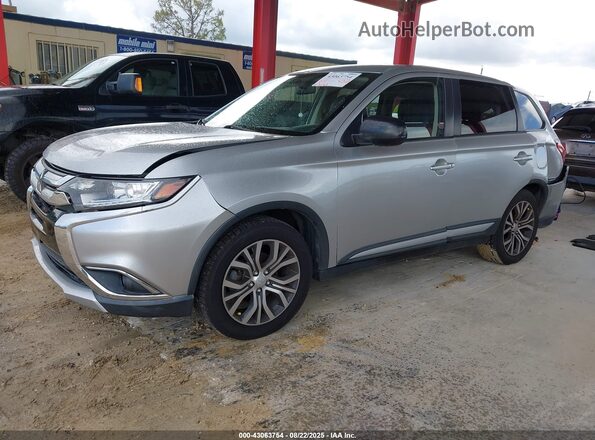 JA4AD2A38JZ001384 2018 MITSUBISHI OUTLANDER Серебряный Передняя левая четверть