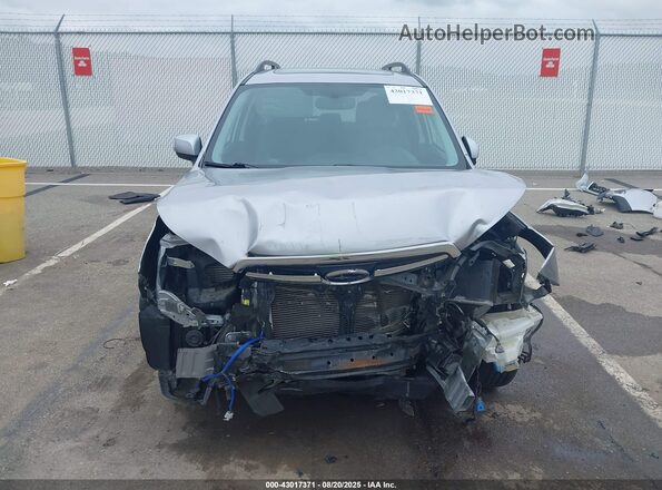 JF2SJAVC0GH545126 2016 SUBARU FORESTER 2.5I TO Silver Widok wnętrza z tyłu