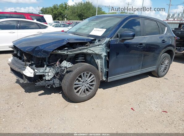 JM3KFACM6M0481753 2021 MAZDA CX-5 Blue Առջևի ձախ երեք քառորդ տեսարան