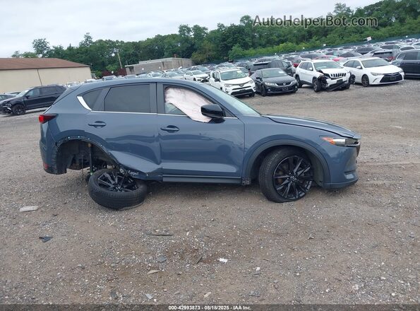 JM3KFBCY1M0425826 2021 MAZDA CX-5 Gray Widok wnętrza z tyłu