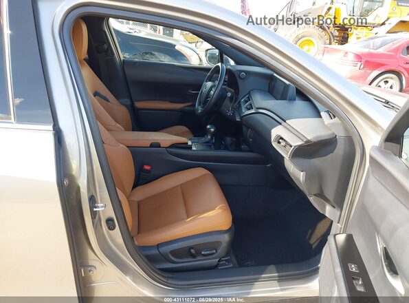 JTHX3JBH7L2029145 2020 LEXUS UX 200 Золотой Вид салона спереди