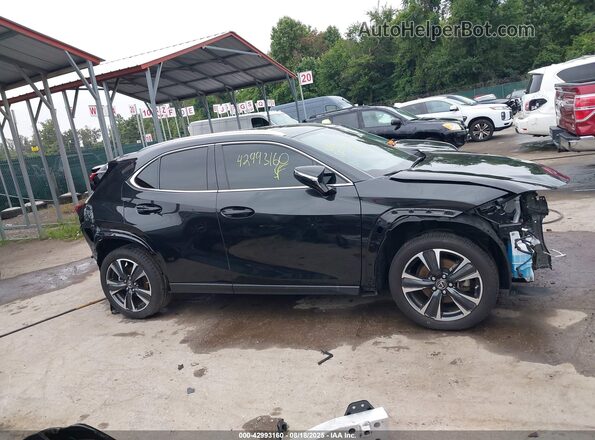 JTHX9JBH1R2074296 2024 LEXUS UX Black 360 interior view
