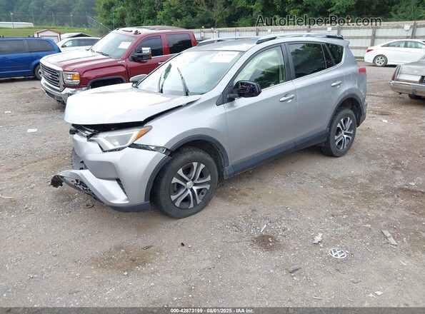 JTMBFREV8JJ221857 2018 TOYOTA LE Silver Առջևի ձախ երեք քառորդ տեսարան