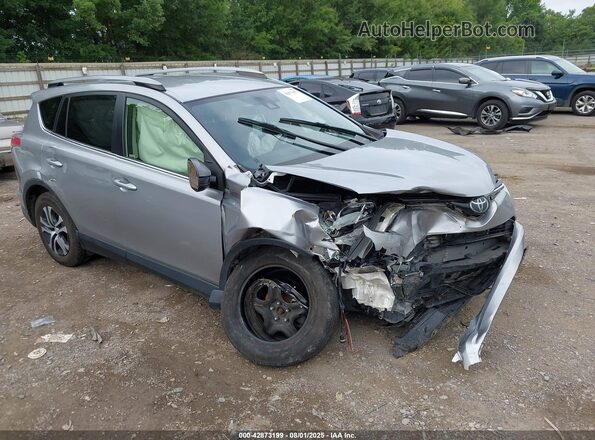 JTMBFREV8JJ221857 2018 TOYOTA LE Silver Դիմացի տեսք