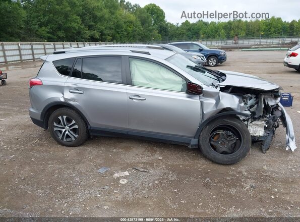 JTMBFREV8JJ221857 2018 TOYOTA LE Silver Սալոնի հետևի տեսք