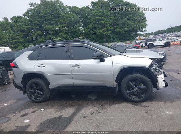 JTMEWRFV2LJ032751 2020 TOYOTA RAV4 HYBRID Silver Widok wnętrza z tyłu