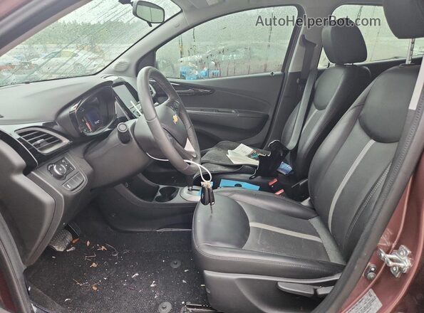 KL8CH6SA5MC736332 2021 CHEVROLET SPARK Maroon Front interior view
