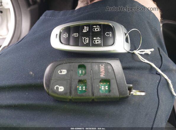 KM8JECD19RU180963 2024 HYUNDAI TUCSON HYBRID Белый Вид панели приборов