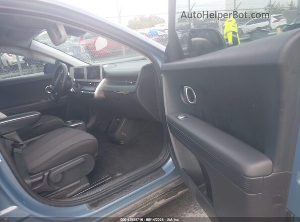 KM8KM4AB2PU144944 2023 HYUNDAI IONIQ 5 Blue Widok wnętrza z przodu