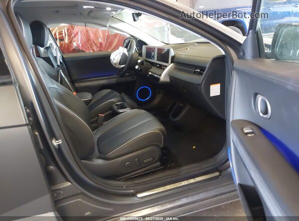 KM8KRDAF8PU217352 2023 HYUNDAI IONIQ 5 Бежевый Вид салона спереди