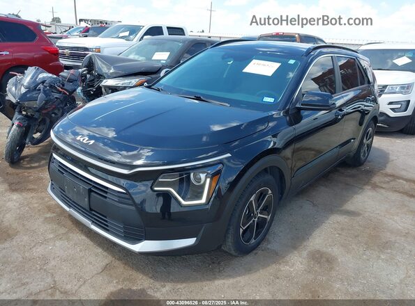 KNDCP3LE6P5090818 2023 KIA NIRO Black Vista tres cuartos delantera izquierda