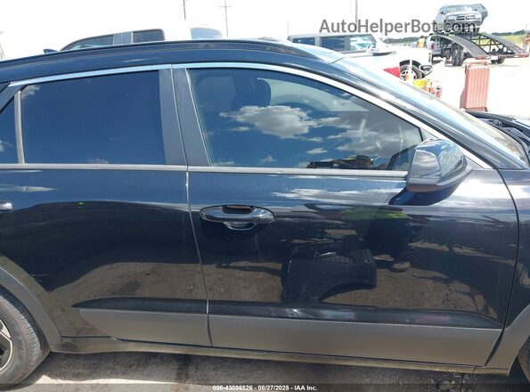 KNDCP3LE6P5090818 2023 KIA NIRO Black Vista interior trasera