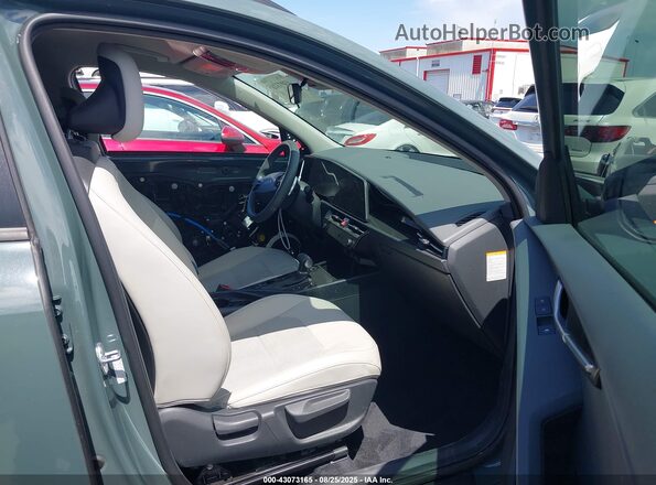 KNDCR3LEXP5080352 2023 KIA NIRO Зеленый Вид салона спереди