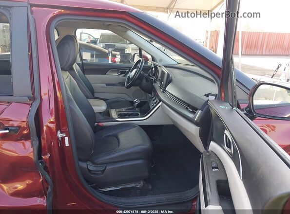 KNDNB4H35P6289907 2023 KIA CARNIVAL MPV Red Vista interior delantera
