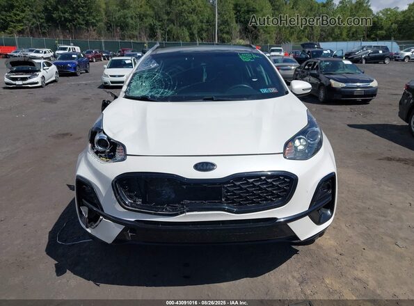 KNDP6CAC9M7854585 2021 KIA SPORTAGE White ხელსაწყოთა პანელის ხედი