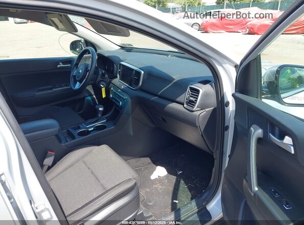 KNDPMCAC7M7895495 2021 KIA SPORTAGE Silver Вид салону спереду