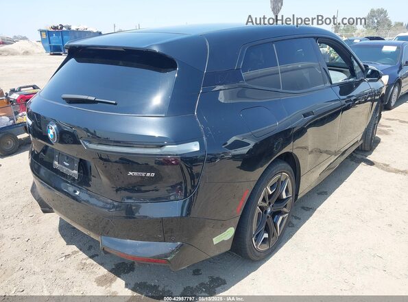 WB523CF02RCN52082 2024 BMW IX Black Trasero derecho