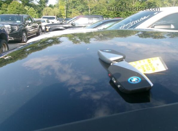 WB523CF05PCM84986 2023 BMW IX  Widok naklejki z numerem VIN