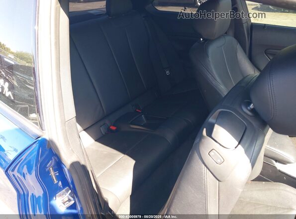 WBA2J1C57JVD09438 2018 BMW 2 SERIES Blue VIN կոդի պիտակի տեսք