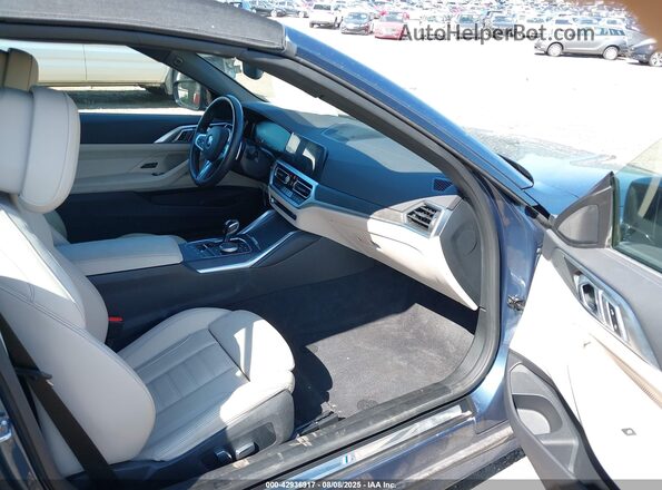 WBA43AT00PCM07414 2023 BMW 4 SERIES Blue Vista interior delantera