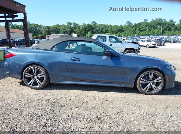 WBA43AT00PCM07414 2023 BMW 4 SERIES Blue Vista interior trasera
