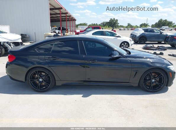 WBA4A9C57GG508409 2016 BMW 4 SERIES Black Вид задньої частини салону