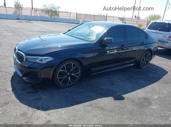 WBA53BH06MCF79240 2021 BMW 5 SERIES Black Widok wnętrza z tyłu