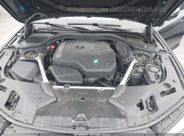 WBA53BH0XPCM61791 2023 BMW 5 SERIES Black Вид ззаду