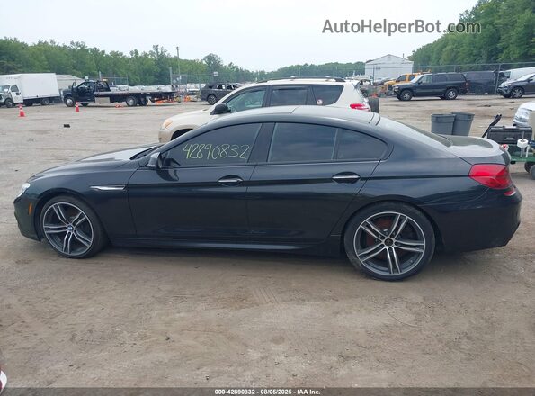 WBA6D0C57JG852938 2018 BMW 6 SERIES Black Rear interior view