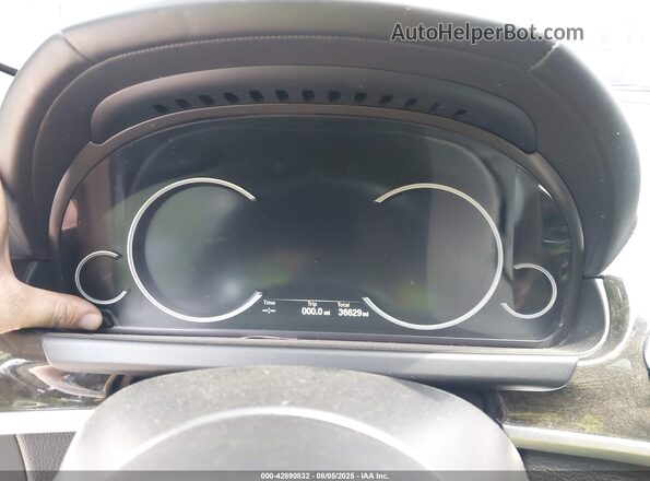 WBA6D0C57JG852938 2018 BMW 6 SERIES Black Rear seats view