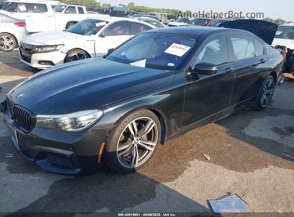 WBA7E2C59KB217750 2019 BMW 7 SERIES Черный Передняя левая четверть