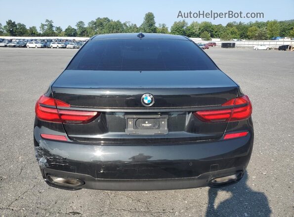 WBA7E4C50KGV28708 2019 BMW 7 SERIES Black Widok z tyłu